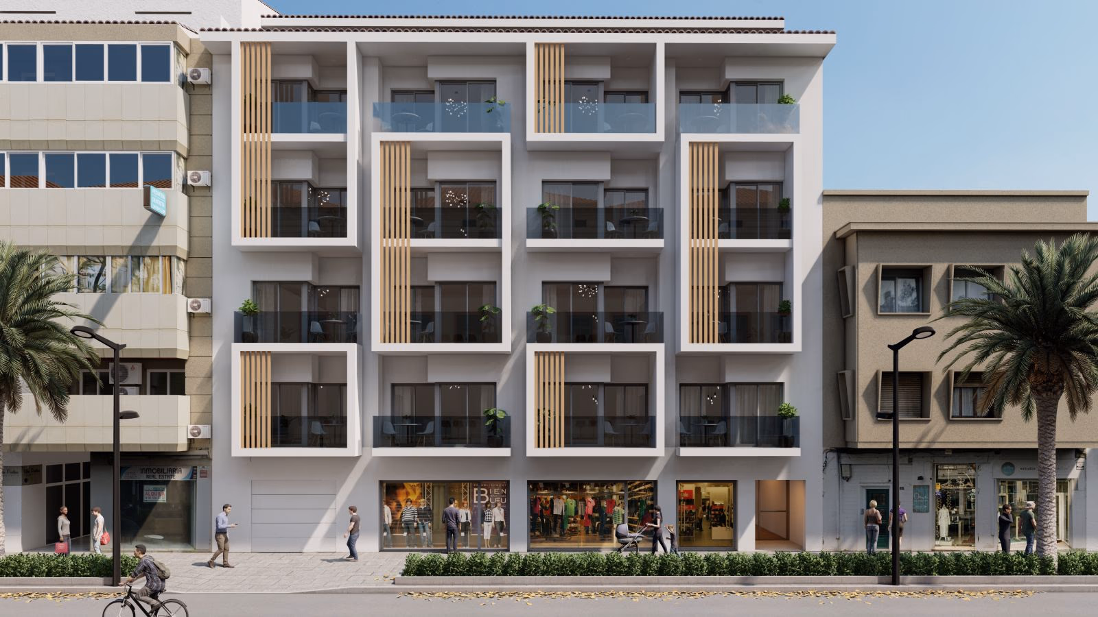 Street facade of the Viva Altea Beach building with shops below