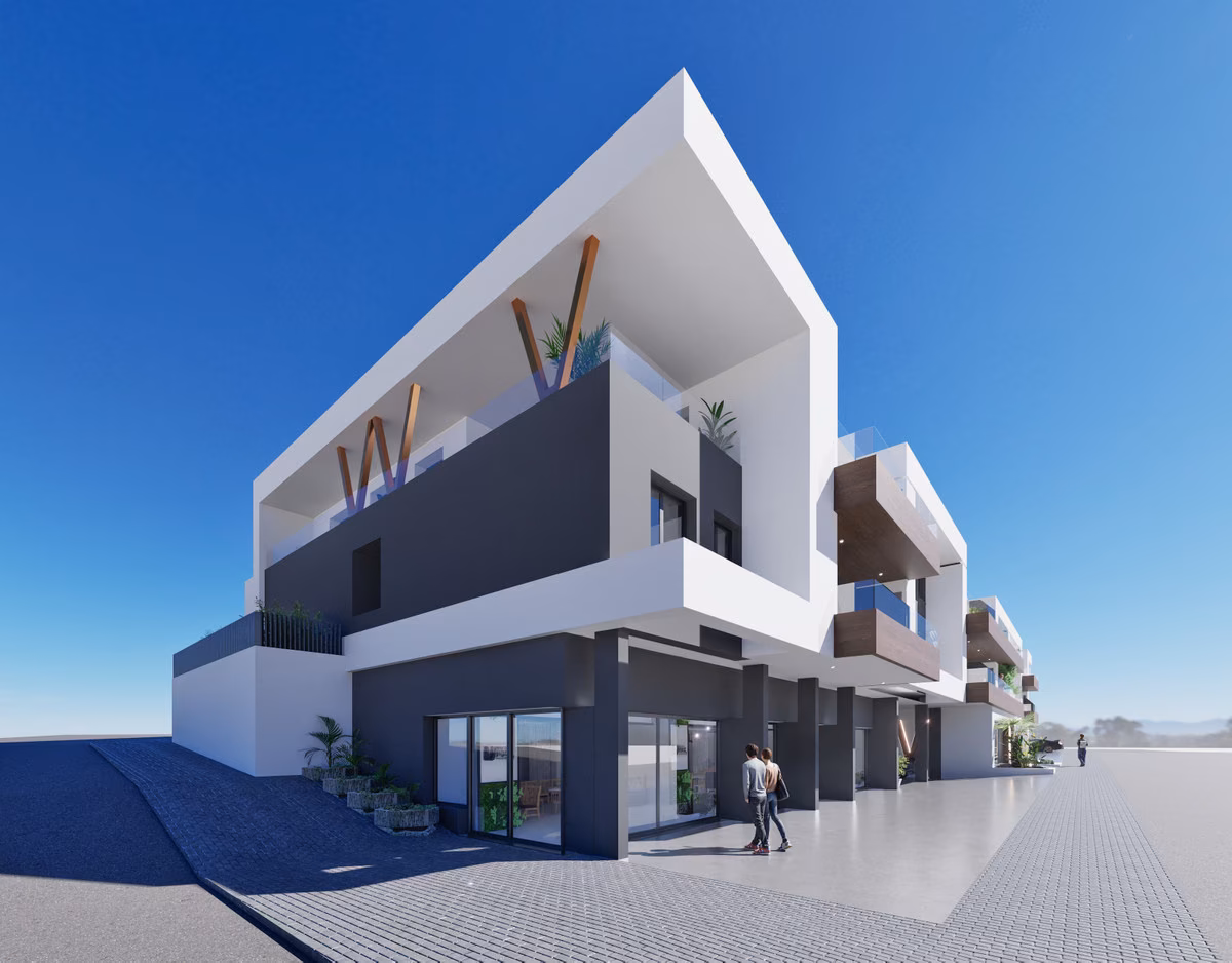 White corner facade of Waldorf Astoria seen from the street, Benijófar