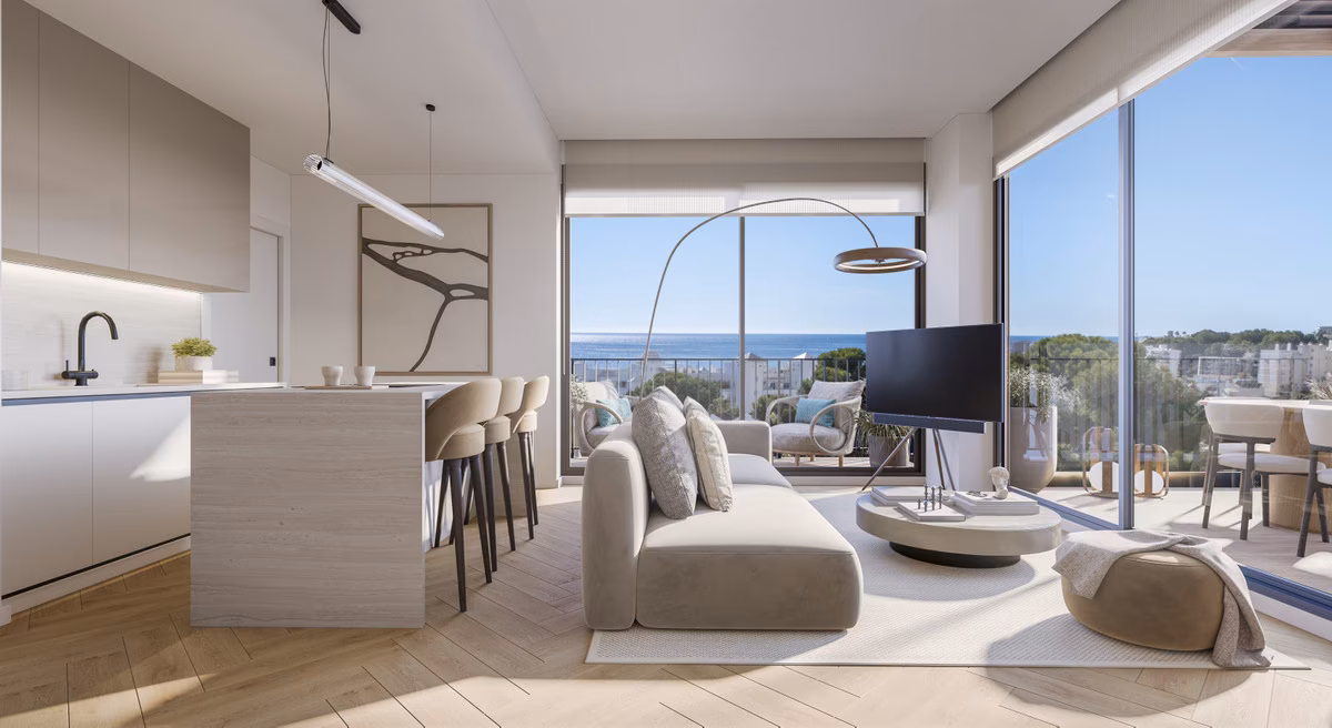 Open-plan living room with sea view at Ykines
